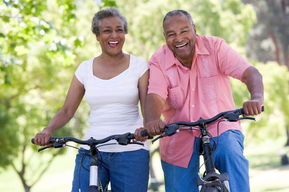 Couple on bikes.